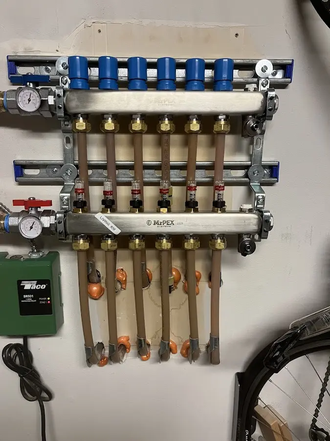 Plumber performing Water Heater Repair at a residential property in Jacinto City